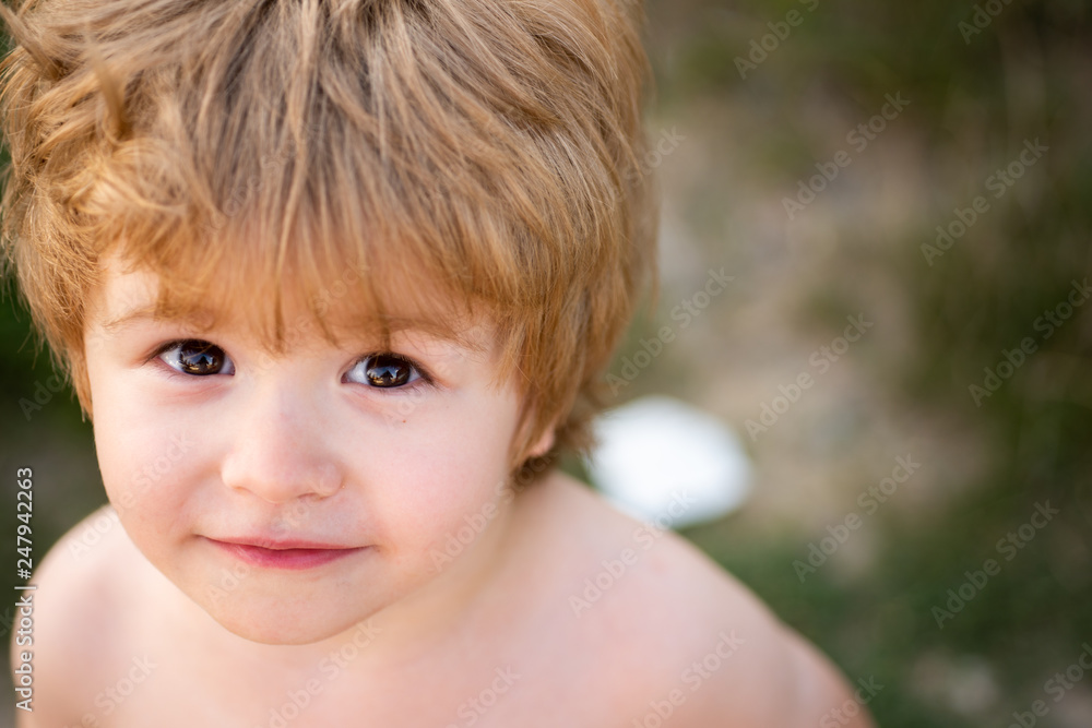 Sweet child. Boy portrait. Summer mood holiday on nature. Beautiful baby boy looking at the camera. Happy kid concept. Sweet child. Boy portrait. Summer mood holiday on nature. Beautiful baby boy looking at the camera. Happy kid concept.