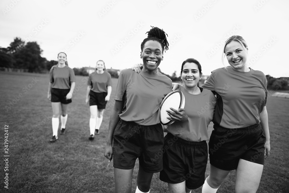 Obraz premium Energetic female rugby players walking together