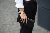 Man hands with purse. Close up. Money concept