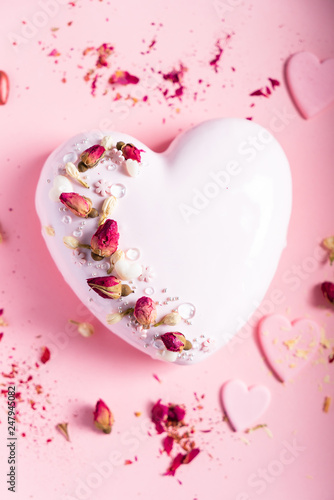 Cake with berries in the shape of heart on Valentine's Day