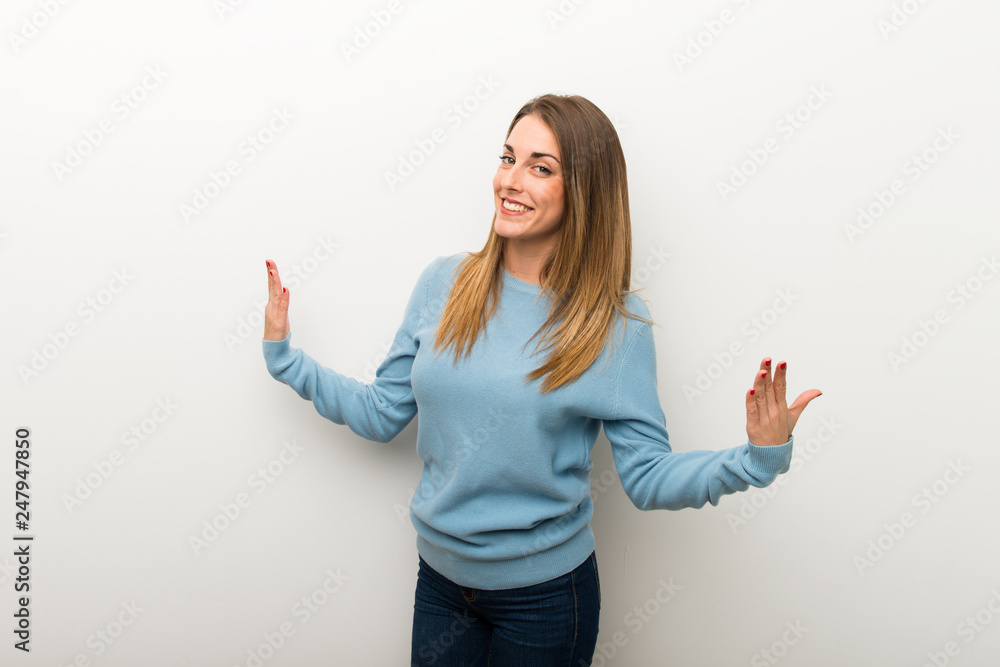 Blonde woman on isolated white background proud and self-satisfied in love yourself concept Blonde woman on isolated white background proud and self-satisfied in love yourself concept