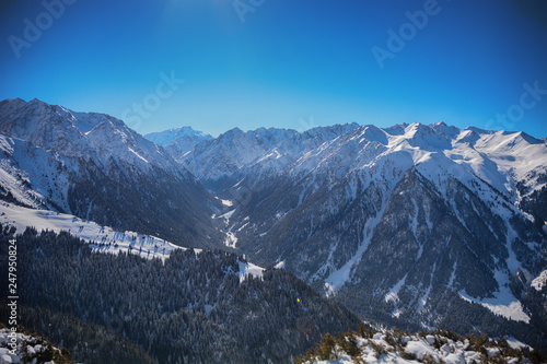 Scenic alpine landscape with and mountain ranges. © sergfear