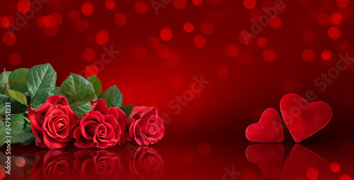 Decorative card for Valentines Day or wedding with roses bouquet and two hearts on red background with glowing bokeh