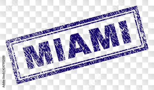 MIAMI stamp seal print with rubber print style and double framed rectangle shape. Stamp is placed on a transparent background. Blue vector rubber print of MIAMI text with retro texture.