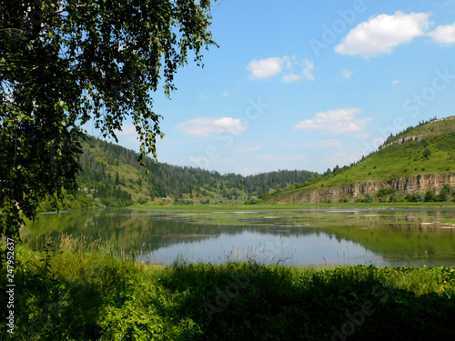 landscape with lake and blue sky