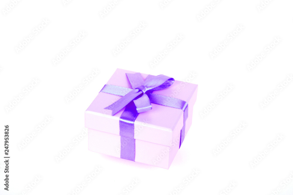 gift box with purple bow and white background gift box with purple bow and white background