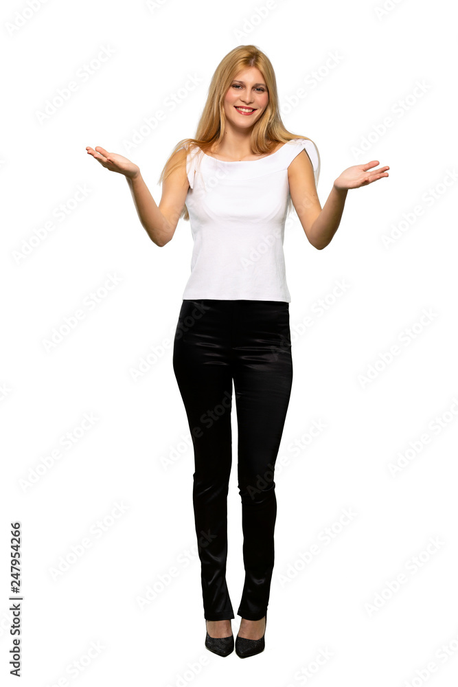 Young blonde woman presenting and inviting to come with hand over isolated white background Young blonde woman presenting and inviting to come with hand over isolated white background