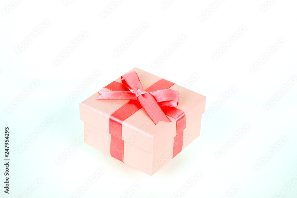 Obraz premium gift box with red bow and white background