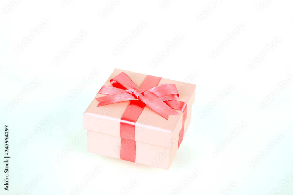 gift box with red bow and white background gift box with red bow and white background