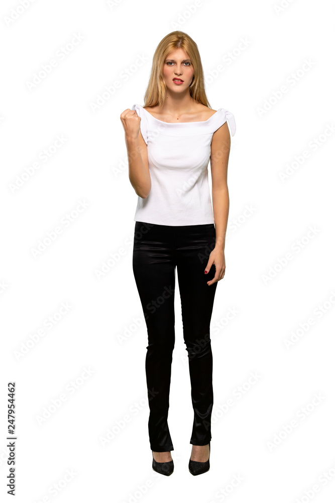 Young blonde woman with angry gesture over isolated white background Young blonde woman with angry gesture over isolated white background