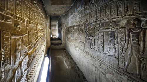 Egypt Dendera Temple Hathor. Ancient images on the walls of the underground room. Great Menate of Goddess Hathor photo