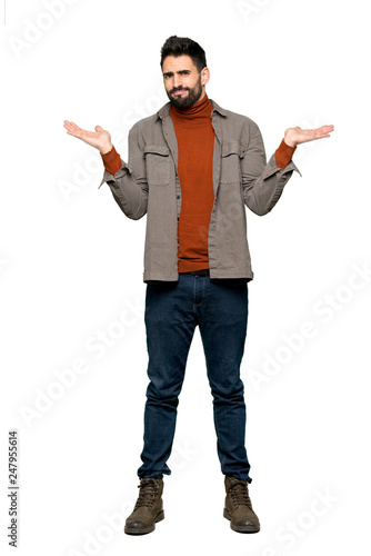Full-length shot of Handsome man with beard unhappy and frustrated with something because not understand something on isolated white background