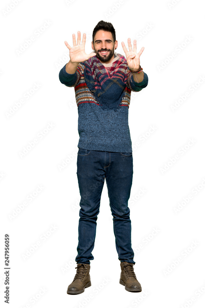 Full-length shot of Hippie man counting nine with fingers on isolated white background Full-length shot of Hippie man counting nine with fingers on isolated white background