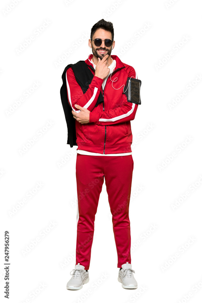 Full-length shot of Handsome sportman with glasses and smiling on isolated white background Full-length shot of Handsome sportman with glasses and smiling on isolated white background