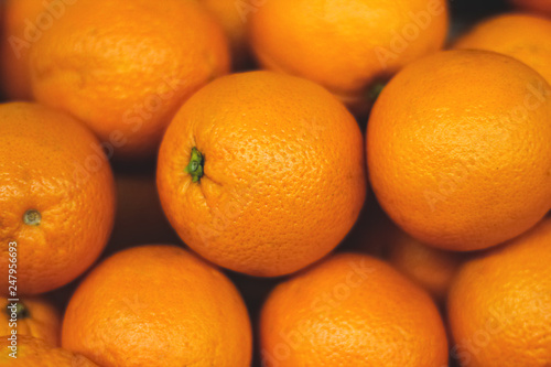  Fresh oranges texture. Bunch of fresh  oranges on market  Stack of oranges. Pile of a Fresh Oranges for Background. Orange fruit background