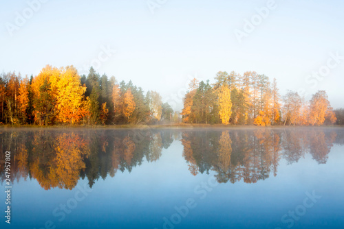 Beautiful autumn morning landscape of Kymijoki river waters in fog. Finland, Kymenlaakso, Kouvola.