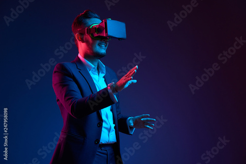 Businessman conducting meeting in vr glasses photo