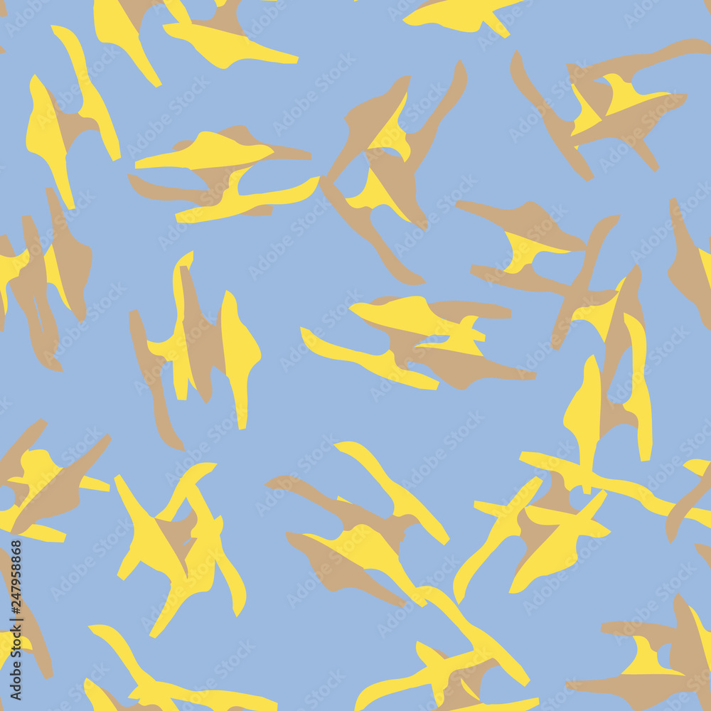 UFO camouflage of various shades of yellow, brown and blue colors UFO camouflage of various shades of yellow, brown and blue colors