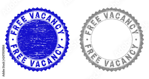 Grunge FREE VACANCY stamp seals isolated on a white background. Rosette seals with grunge texture in blue and grey colors. Vector rubber watermark of FREE VACANCY caption inside round rosette.