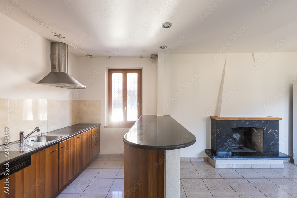 Fototapeta premium Eat-in kitchen with fireplace