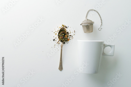concept of drinking tea without plastic single use teabag. reusable  metalic infuser photo