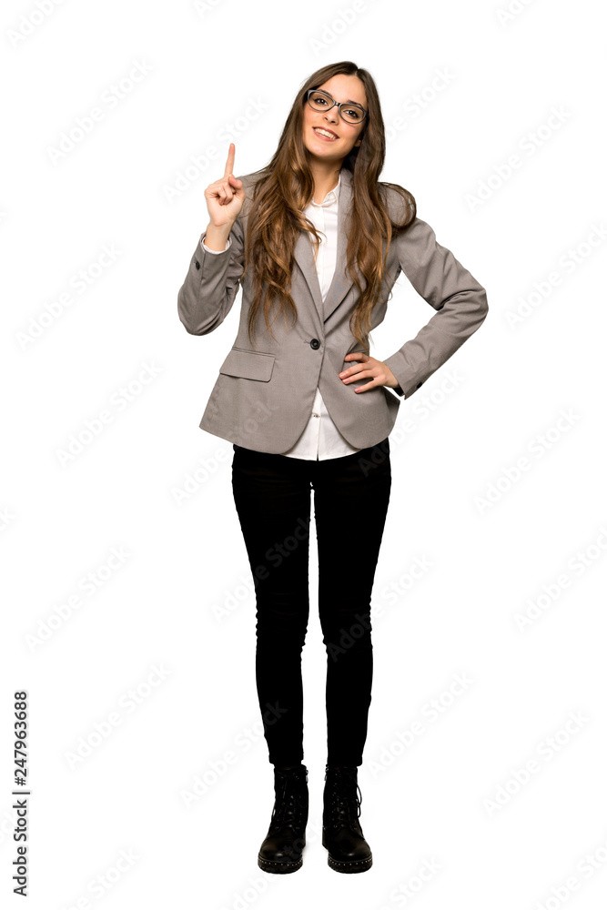 Full-length shot of Business woman showing and lifting a finger in sign of the best on isolated white background Full-length shot of Business woman showing and lifting a finger in sign of the best on isolated white background