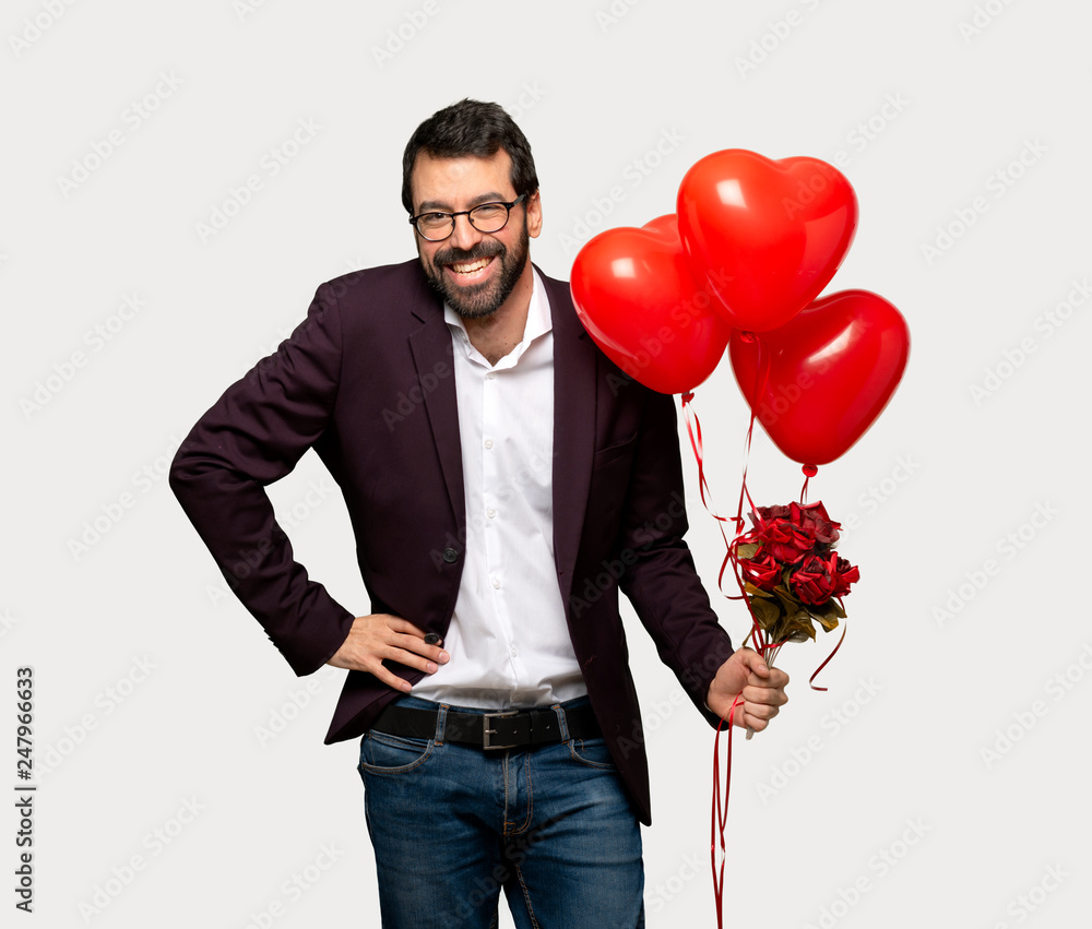 Man in valentine day happy and smiling over isolated grey background Man in valentine day happy and smiling over isolated grey background