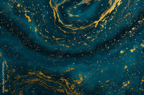 Abstract paint texture art. Natural luxury. Blue paint with gold glitter powder. Marble background.