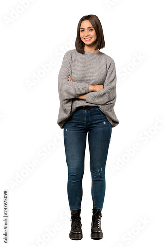 Photos A full-length shot of a Young woman keeping the arms crossed in frontal position