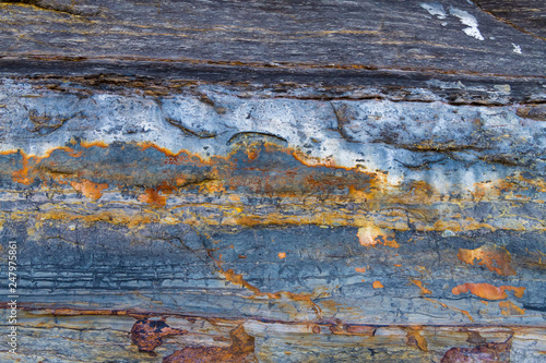 Colourful stone background texture  abstract formation of mineral rock in marine environment