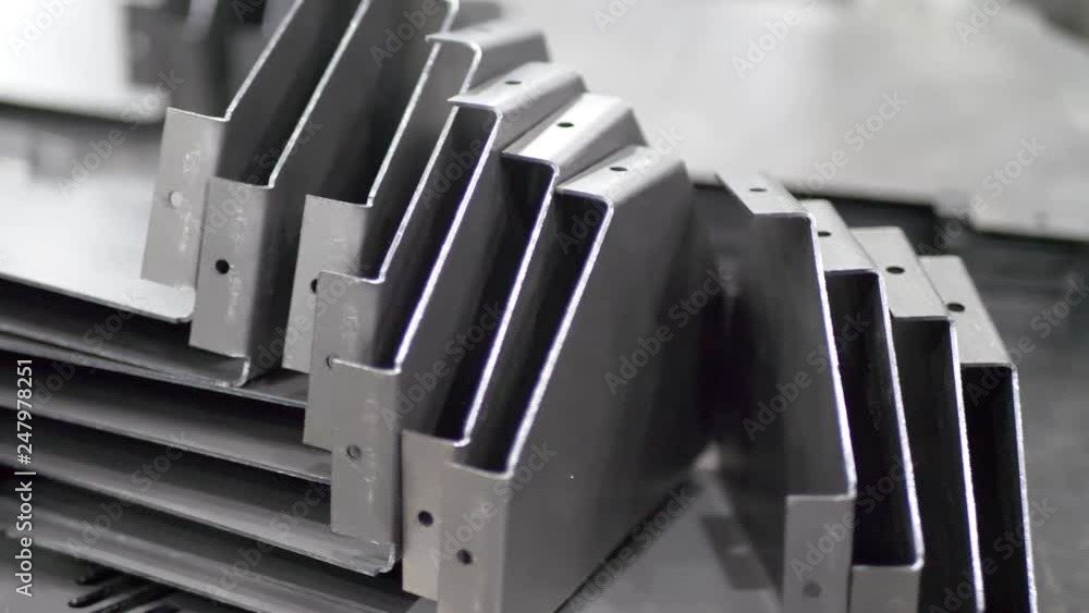Metal parts after cutting and bending process