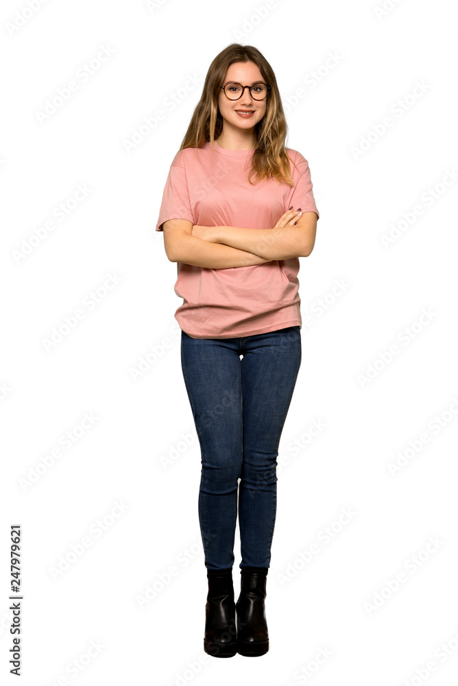 A full-length shot of a Teenager girl with pink sweater with glasses and happy on isolated white background A full-length shot of a Teenager girl with pink sweater with glasses and happy on isolated white background