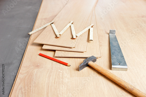 Group of tools to laying laminate at home