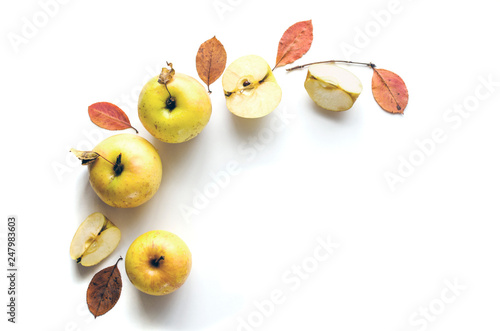 Fresh yellow apples Golden on a white background with yellow leaves. Autumn the composition. Isolated objects. Flat lay, top view. Minimal concept. Copy space. Mock-up