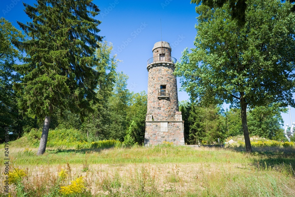 Fototapeta premium Bismarck tower - one of about 240 monuments built across the Germany to honour its first chancellor - Otto von Bismarck, Ostroda, Poland (former Osterode, East Prussia)