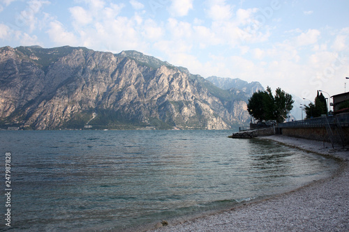 Evening walk. Picturesque lake Garda