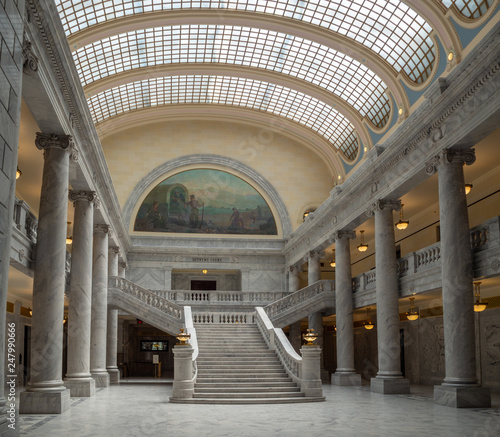 State of Utah Capitol hill complex in Salt Lake City, historic exterior and rotunda dome interior with house, senate and soupreme court chamber, staircase, and paintings, tourist visitors