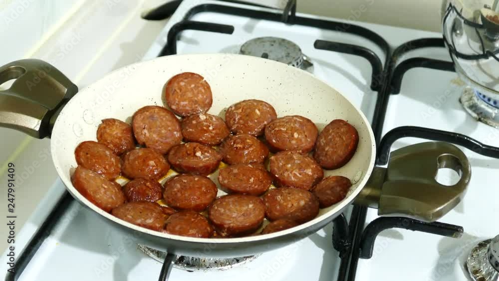 cook sausage in the pan for breakfast, close-up, cook sausage in the pan for breakfast, close-up,