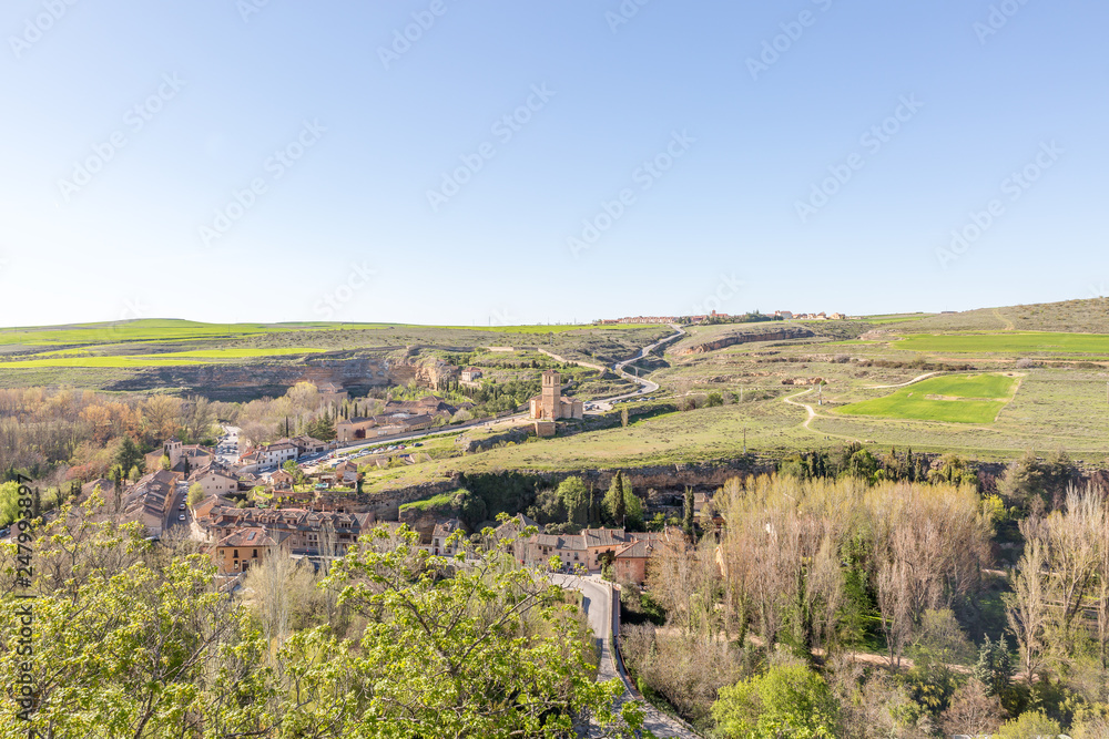 View of a landscape on the outskirts of the city of Segovia, with some religious buildings
