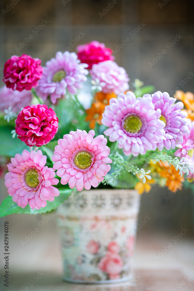 Obraz premium A bouquet of flowers in a vase