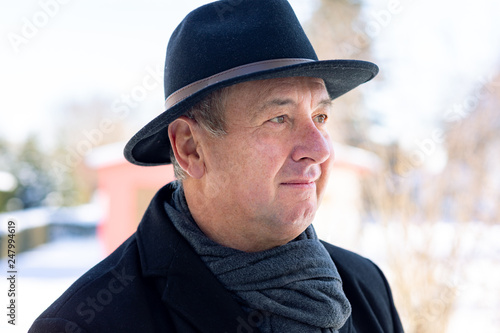 Portrait of a senior with hat