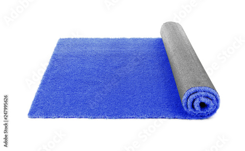Rolled artificial grass carpet on white background. Exterior element