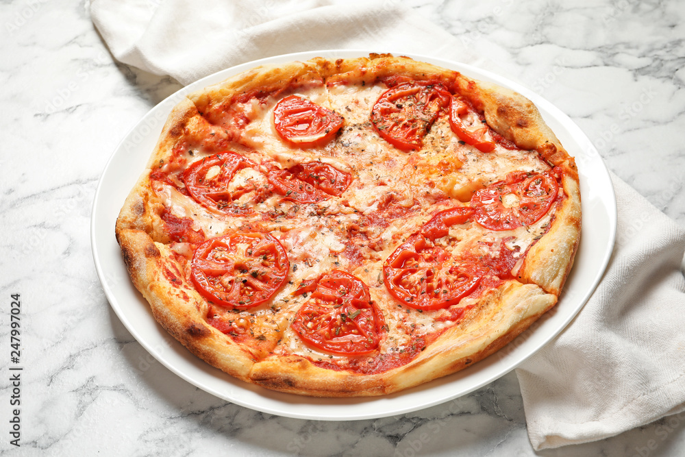Hot cheese pizza Margherita on marble table Hot cheese pizza Margherita on marble table