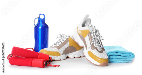 Composition with fitness gym equipment on white background