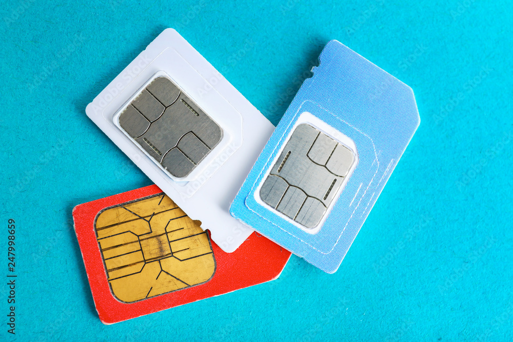 Sim cards on color background Sim cards on color background