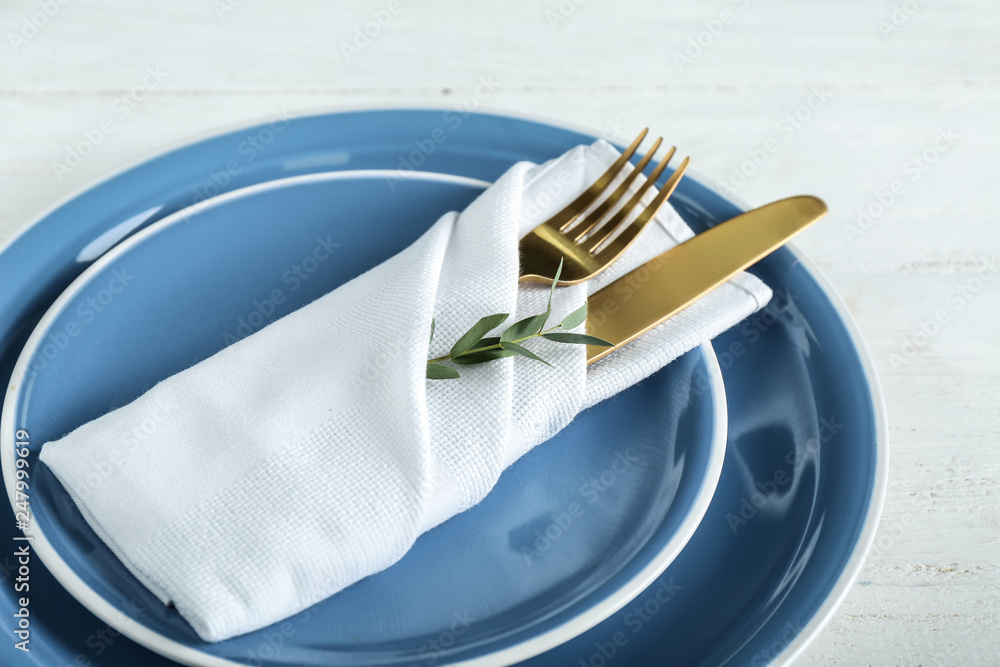 Simple table setting on white wooden background Stock Photo | Adobe Stock