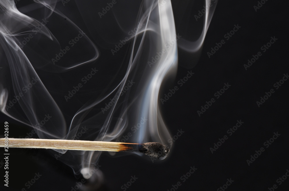 burned match stick on black burned match stick on black
