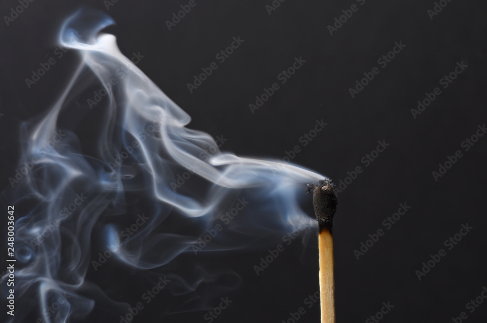 burned match stick on black burned match stick on black