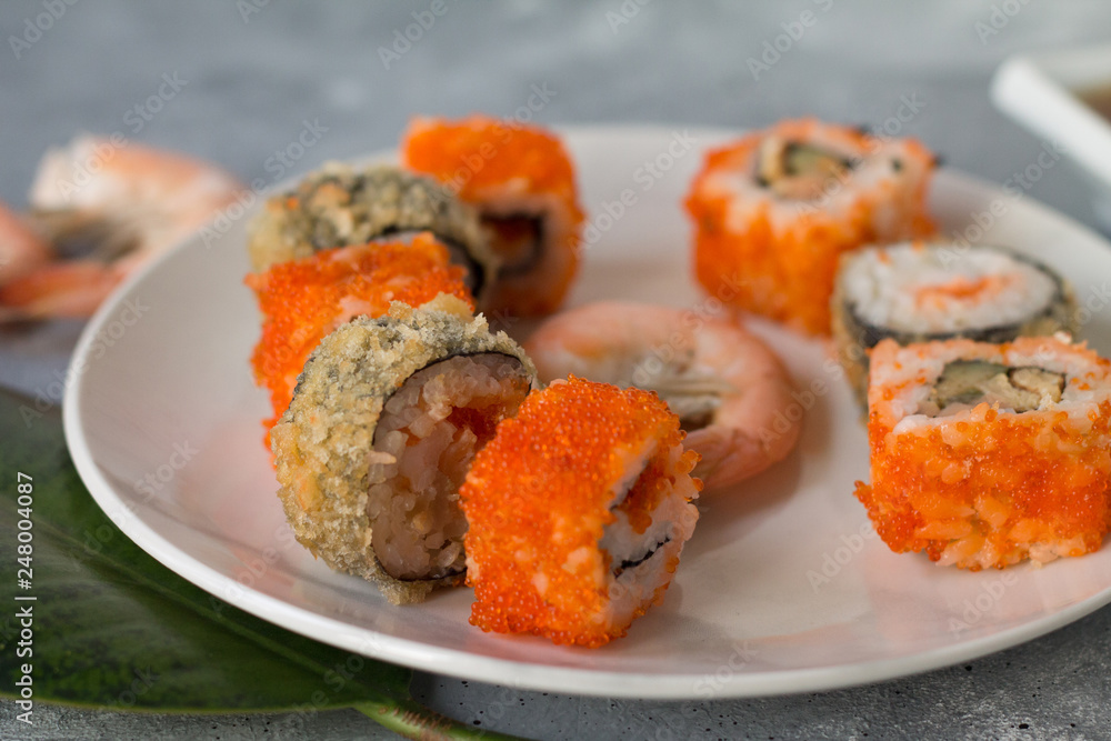 delicious sushi rolls with fresh fish caviar and soy sauce useful delicious sushi rolls with fresh fish caviar and soy sauce useful