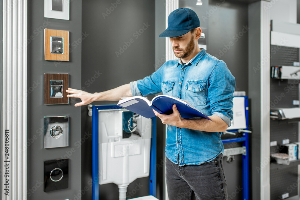 Man in the plumbing shop Man in the plumbing shop